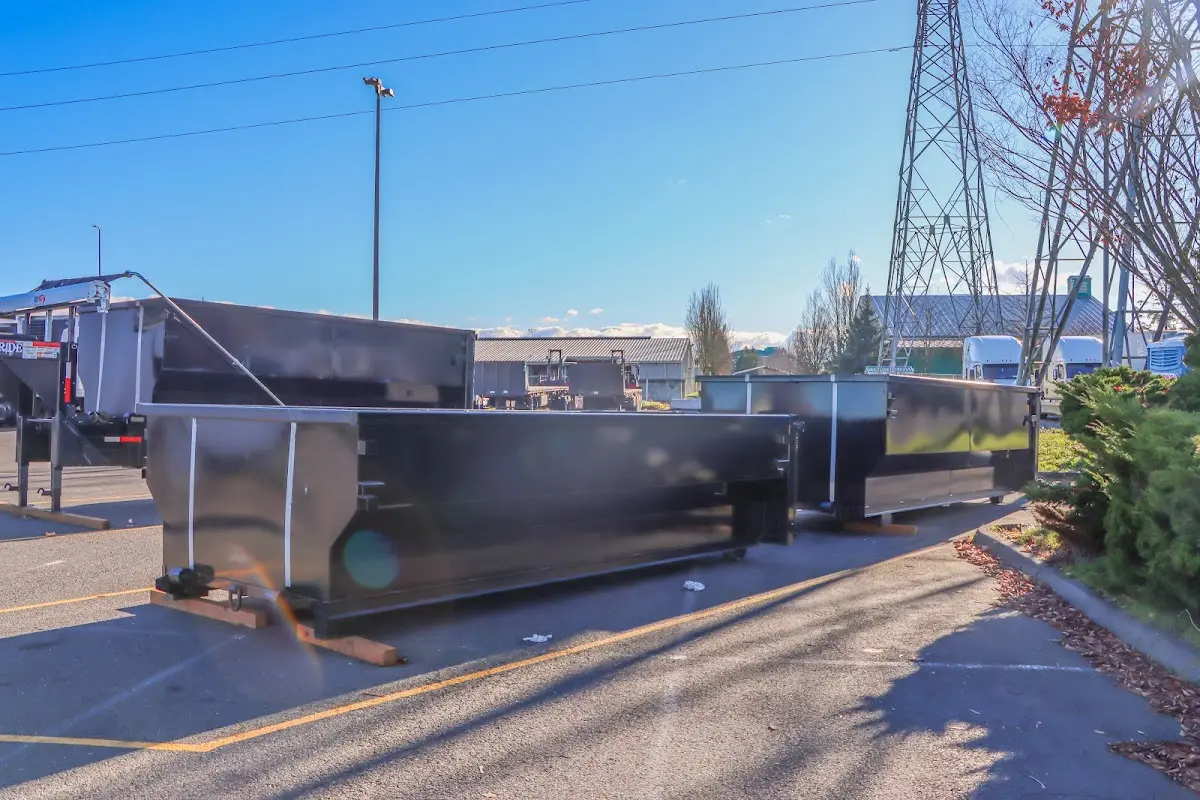 Roll-off dumpster ready for waste disposal at job site for Roofing Dumpster Rental in Weston
